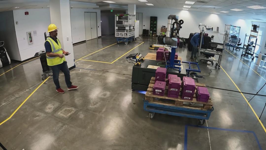 SAM-2: This video contains humans in a warehouse